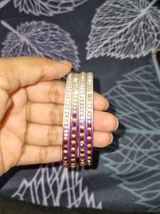 purple and white colour  bangles  with diamonds