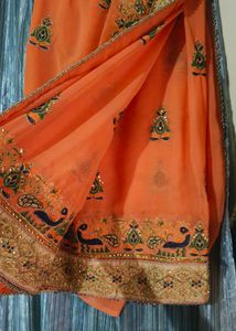 Elegant Orange Embroidered Saree