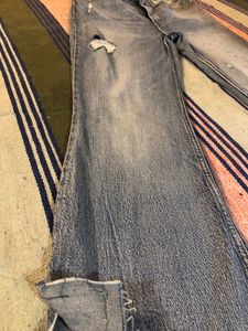 Levi’s High Rise Bootcut Raw Hem Jeans