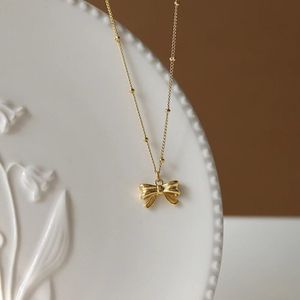Bow Pendant Necklace