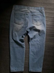 Ripped Light Wash Denim Jeans
