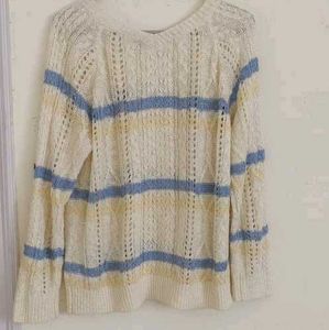a blue white woolen sweatshirt
