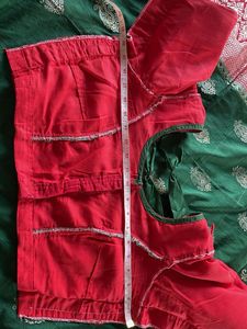 Green Banarasi Saree with Red Blouse