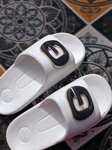 White Slides with &#39;G&#39; Logo