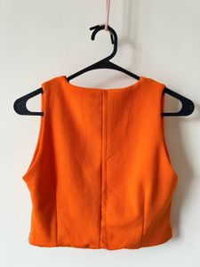 Orange Twist Front Top