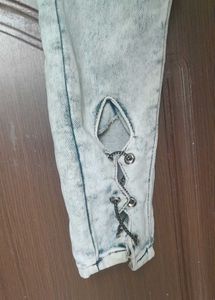 light grey, acid-wash or faded jeans.