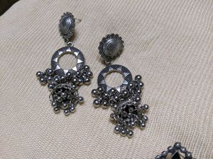 Silver Earrings And Ring