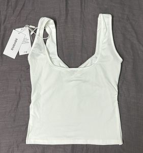 SAVANA Side Slit Sleeveless Top