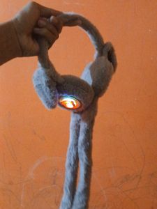 A Rabbit Head Phone Like Band They Cover Our Ear