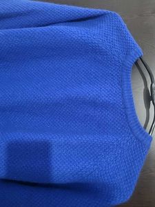 Branded Almost new -Blue Self design Sweater.