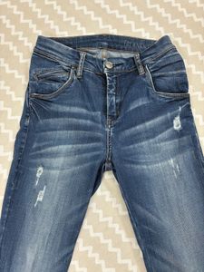 Ripped Bootcut Jeans