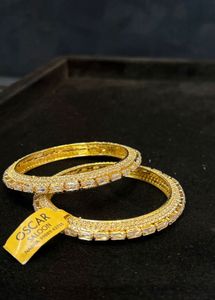 Oscar golden bangles
