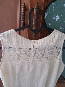 Sleeveless Top With Lace Cut-out