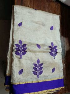 Elegant Beige & Purple Embroidered Saree