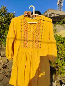 Yellow Embroidered short kurti (offer)
