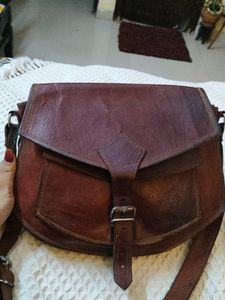 raw leather slingbag