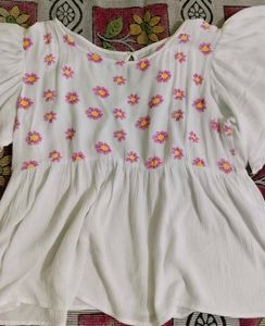 Daisy Embroidered Peplum Top