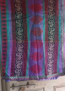 Red, Purple And Green Net Saree.