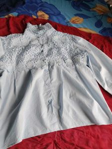A Beautiful Woman&#39;s Blue shirt