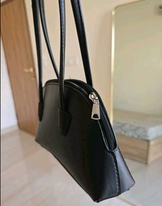 Sleek Black Mini Crescent Shoulder Bag