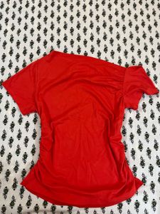 Red one shoulder top