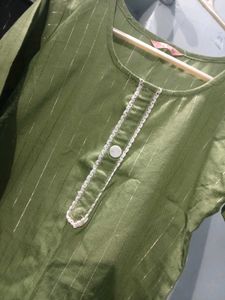 Pistachio Green Coloured Kurti With Thin Strips