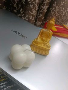 Buddha Idol And Bubble Candle