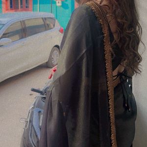 Elegant Bronze Sari with Intricate Gold Border