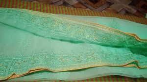 Elegant Mint Green Ethnic Semi Stitch lenhga Gown