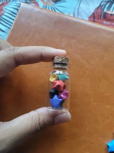 Glass Jars Filled With Paper Stars