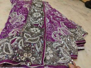 very heavy work purple saree