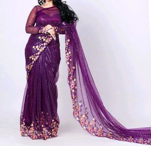 Celebrity Purple Netted Saree With Designer Blouse