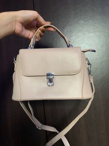 Nude Sling Bag With Silver