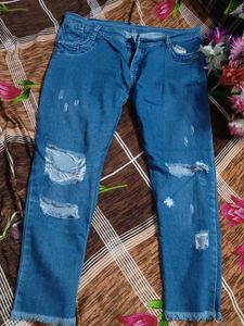 Ripped Blue Denim Jeans