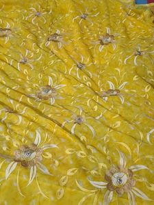 Yellow Saree with beautiful Flowers