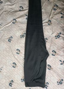 Black stretchable pants can fit 30,32,34 waist