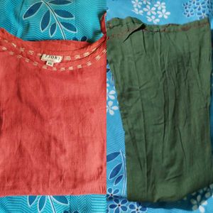 Red A-line kurti with green palazo pant Set.