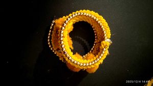 Yellow Bracelet with Golden Beads