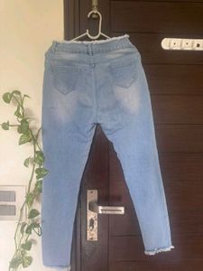 Light Wash Jeans with Raw Hem