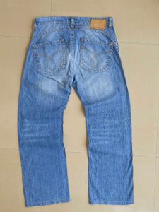 Calvin Klein Light Blue Denim | Waist 34in | Vinta