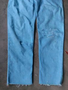 Distressed Light Blue Jeans