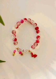 Two Bracelets And One Earrings