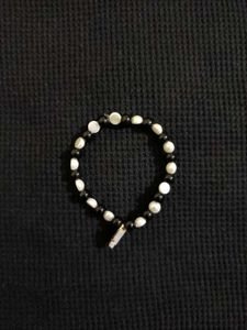 Black & White Bead Bracelet With Butterfly Charm