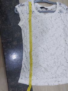 White Coloured Laced Top.