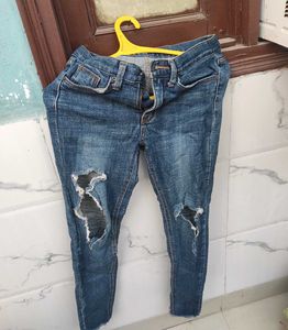 Ripped Knee Denim Jeans