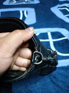 Black Quilted Carrot Sling Bag