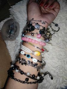 2 Bracelets With One Ring