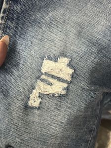 Distressed Denim Jeans