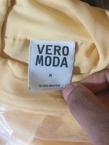 Yellow Sleeveless Ruffle Top