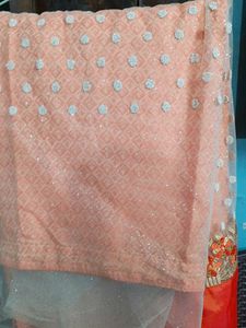 Embroidered silk net saree